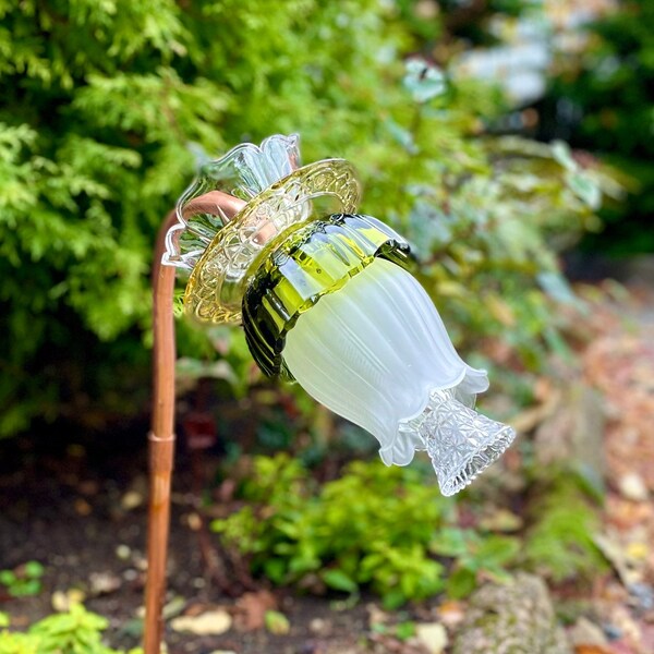 Unique handmade garden art created from copper and vintage glassware in avocado green, golden yellow and crystal clear