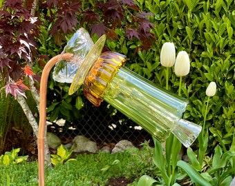 Floral garden art handmade from copper and vintage glassware in yellow, amber and sage green