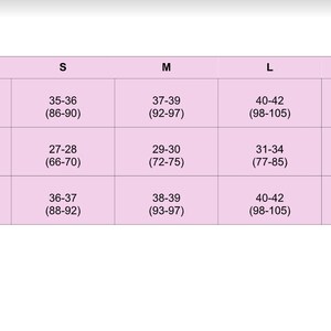 May include: Size chart for clothing with measurements in inches and centimeters. The chart shows sizes XS, S, M, L, XL, and XXL with measurements for bust, waist, and hips.