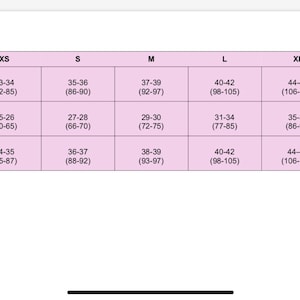 May include: Size chart for clothing with measurements in inches and centimeters. The chart shows bust, waist, and hip measurements for sizes XS, S, M, L, XL, and XXL.
