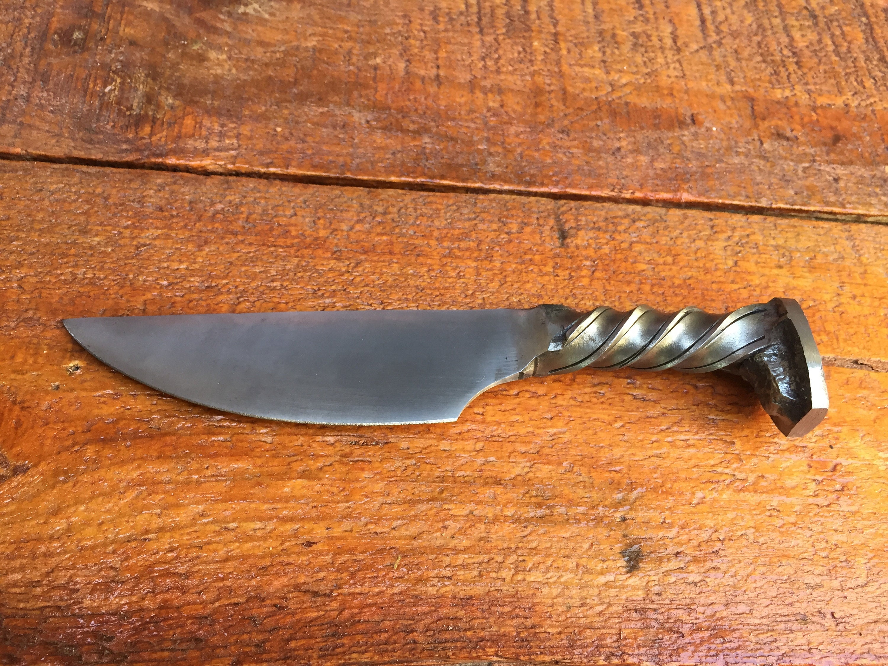 quenching a railroad spike knife quenching a railroad spike knife