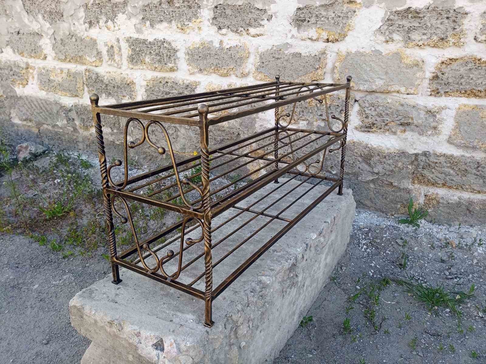 Cast iron store shoe rack