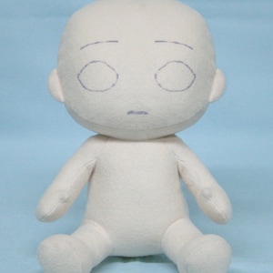 May include: A white plush toy with a simple face, including eyes, eyebrows, and a mouth. The toy is sitting on a light blue background.