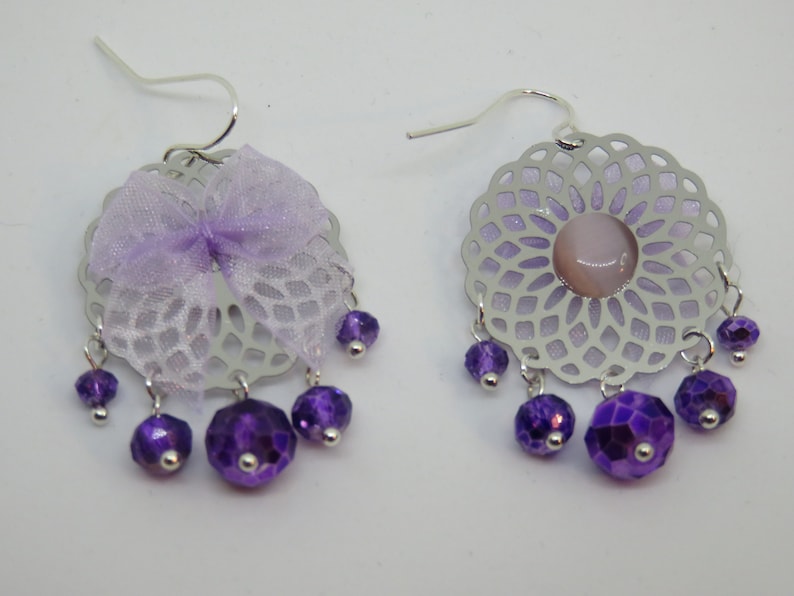 NYLIA silver print with faceted beads and a purple bow