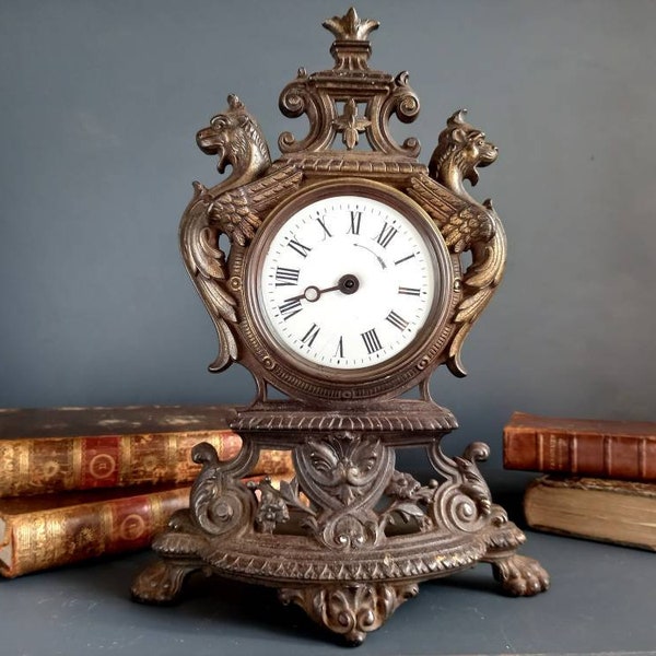 French antique metal clock. French antique clock. French decor. Country house decor. Decorative French clock. Old clock. European decor