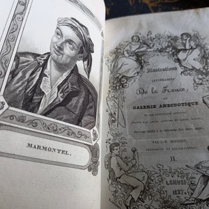 Op de afbeelding: Een zwart-witte illustratie van een man met een tulband op zijn hoofd. De illustratie is ingelijst en heeft het label "MARMONTEL."