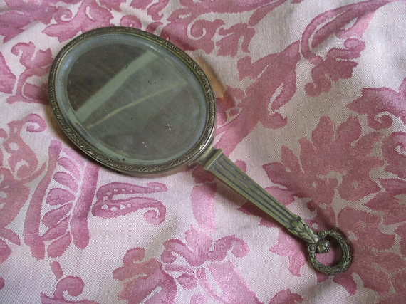 French antique hand mirror. Boudoir mirror. Vintag