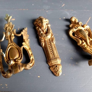 French antique ormolu mounts. French Bronze furniture pediments. Bronze anniversary. Architectural salvage. French antiques. Gilt mounts