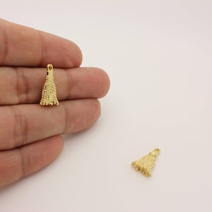 Small 16K gold plated tassel charm for DIY jewelry making and craft projects.