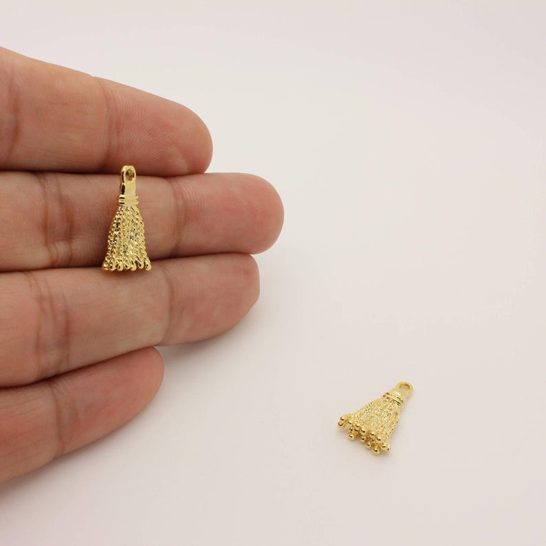 Small 16K gold plated tassel charm for DIY jewelry making and craft projects.