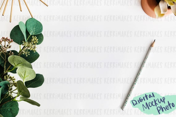 Mockup Photo Of White Desk With Greenery And Pencil Mockup Photo Of White Desk With Greenery And Pencil