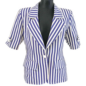May include: A blue and white striped short-sleeved blazer with a single button closure.