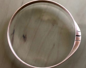 Twists & Turns, START / FINISH Runners Bracelet (Bangle). Mobius strip of 925 sterling silver.