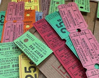 Lot with 100 colorful vintage tickets in paper bag.