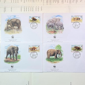 Beautiful WWF envelopes with matching stamps. Set of 4 official first day covers  Cambodja 1997