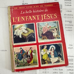 1957 Jesuskind, kleines goldenes Buch. Originalausgabe mit aufgeklebten Werbe-Sammelkarten/Illustrationen. Französisches Kinderbuch