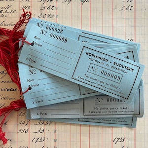 Vintage French watch repair tags. Set of 3