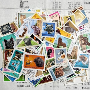 Lote con más de 100 sellos postales de PERROS usados, ideales para diarios artísticos y otras manualidades. NATURALEZA