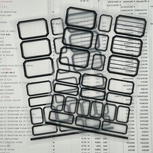 May include: A black and white image of a sheet of paper with multiple black rectangular boxes. The boxes are arranged in a grid pattern and are overlapping. The boxes are all the same size and shape. The paper is covered in text and numbers.