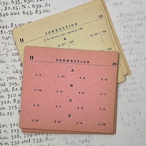 Cartões antigos de multiplicação e divisão da escola francesa.
