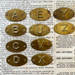 Vintage brass cabinet / drawer plates with letters from France 1950&#39;s.