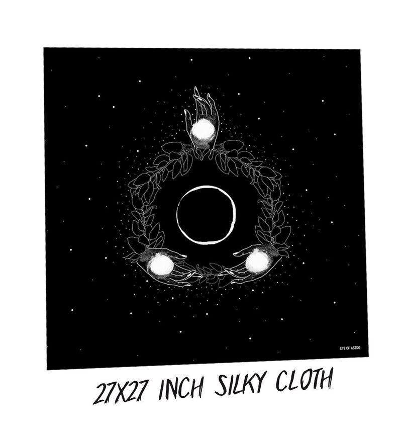 May include: Black and white illustration of a crescent moon surrounded by a wreath of leaves and three white orbs. The design is on a black background with white stars. The text "27X27 INCH SILKY CLOTH" is at the bottom of the image. "EYE OF ASTRO" is in the bottom right corner.