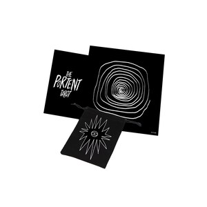 May include: Black and white tarot card deck with a black velvet bag. The bag has a white starburst design with an eye in the center. The card deck box has the text "The Portent Tarot" in white.