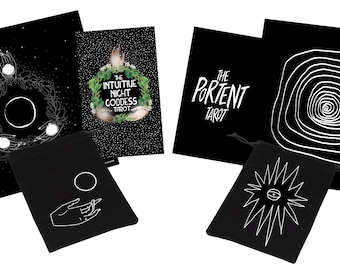May include: A tarot card set featuring black and white illustrations. The set includes cards with celestial and spiral designs, along with two black drawstring bags. One bag has a hand and circle design, the other has an eye design.