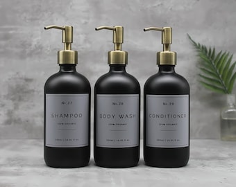 Refillable Matte Black Glass Dispenser Bottle: Light Grey Waterproof Label, Brass Pump