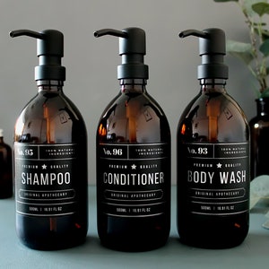 Refillable Dispenser Bottle | Shampoo, Conditioner, Body Wash Set | Amber Glass | Metallic Silver Label with Black or Silver Metal Pump