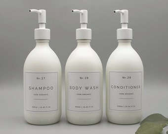 Flacon distributeur de shampooing, après-shampoing et gel douche en verre blanc mat