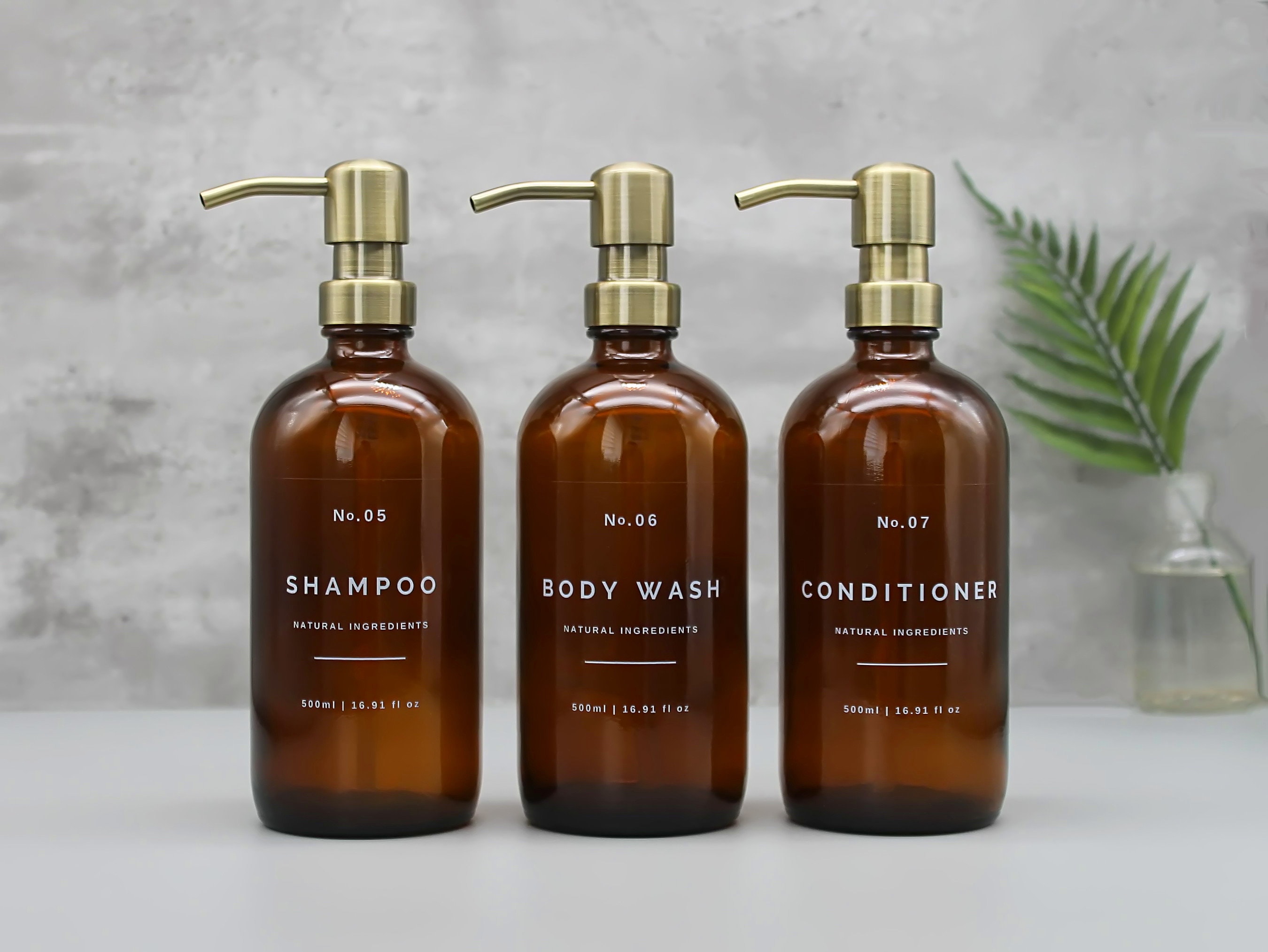 Amber Glass Bottle, Refillable Soap Dispenser for Shampoo, Conditioner, Body Wash, with Brass, Gold Metal Pump - Reusable, Eco-friendly
