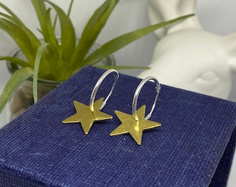 Hammered brass stars on sterling silver hoops