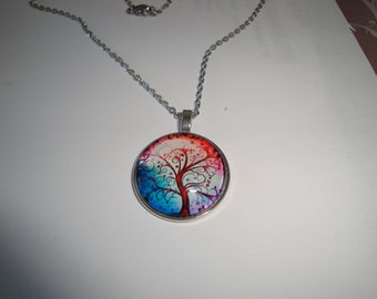 red tree of life pendant necklace in silver metal, mounted on a silver chain