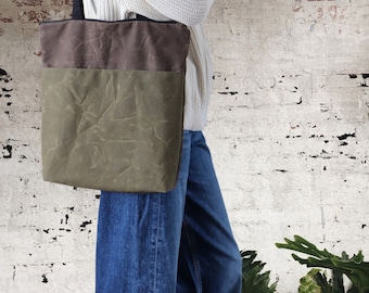 Vegan Waxed Canvas Tote Bag for women and men. Waxed Canvas Shoulder Bag with top zipper and pockets for laptop, books, and essentials.