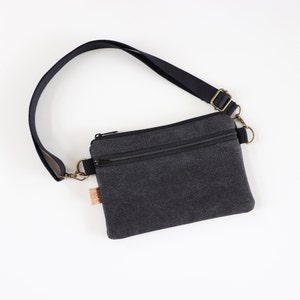 Sac banane en toile noire pour homme et femme. Sac banane hipster végétalien pour la randonnée, le plein air et les voyages.  Sac banane plat décontracté rustique pour femme.