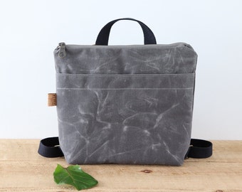 Mini sac à dos en toile cirée pour femme et homme. Petit sac à dos pour les voyages, la randonnée, le plein air et tous les jours. Petit sac résistant à l'eau.