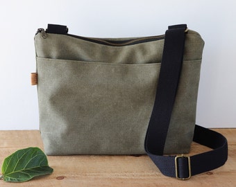 Large Stonewashed Crossbody Bag for women and men. Casual Canvas Purse with wide shoulder strap and exterior pocket.