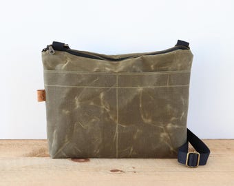 Waxed Canvas Crossbody Bag: Rugged Travel Bag with Zipper