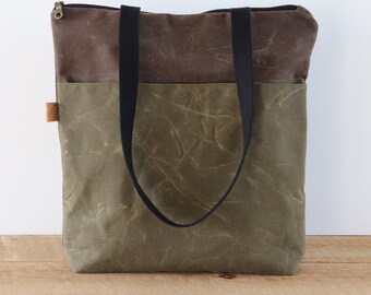 Vegan Waxed Canvas Tote Bag for women and men. Waxed Canvas Shoulder Bag with top zipper and pockets for laptop, books, and essentials.
