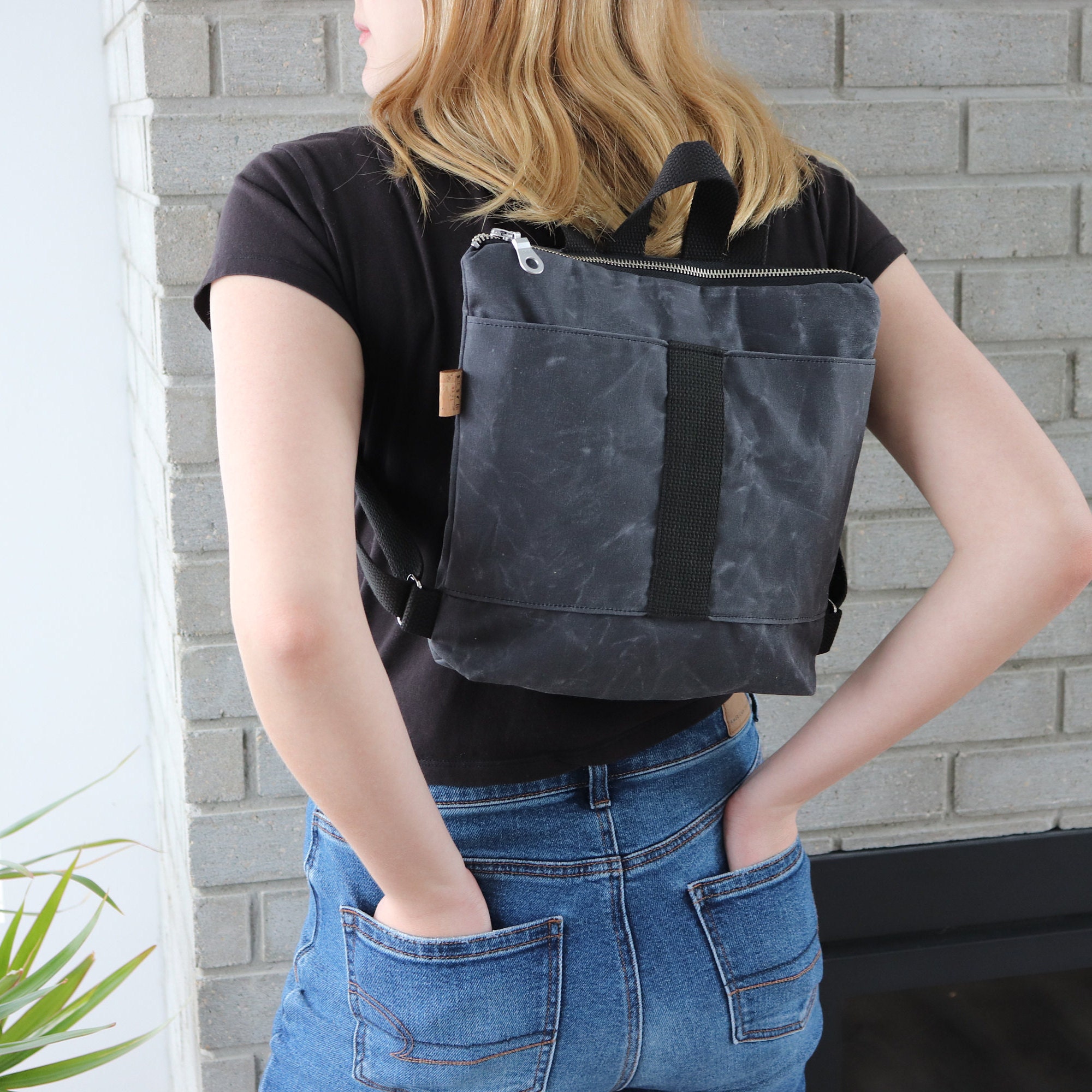 small waxed canvas backpack