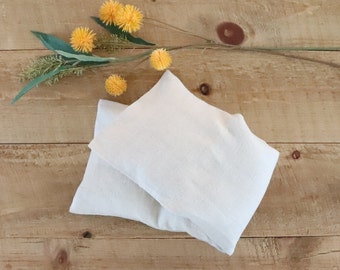 Microwaveable flaxseed warm bag with removable and washable linen cover. Natural heating pack for relaxation, tension, and pain relief.