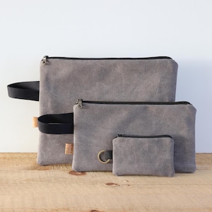 Juego de 3 bolsas de lona con cierre de cremallera para hombres y mujeres. Bolsas para guardar artículos de uso diario, material de arte, libros, cuadernos, artículos de tocador, dinero en efectivo o tarjetas.