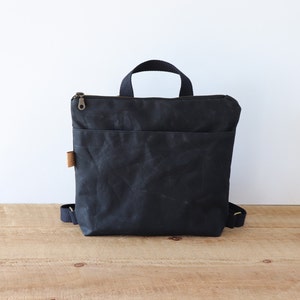 Mini sac à dos en toile cirée pour femme et homme. Petit sac à dos pour les voyages, la randonnée, le plein air et tous les jours. Petit sac résistant à l'eau.