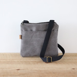 Petit sac à bandoulière en toile pour femme et homme. Mini sac à main mince et solide pour les voyages, la randonnée et l'extérieur.