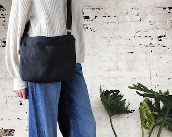 Waxed Canvas Crossbody Bag: Rugged Travel Bag with Zipper