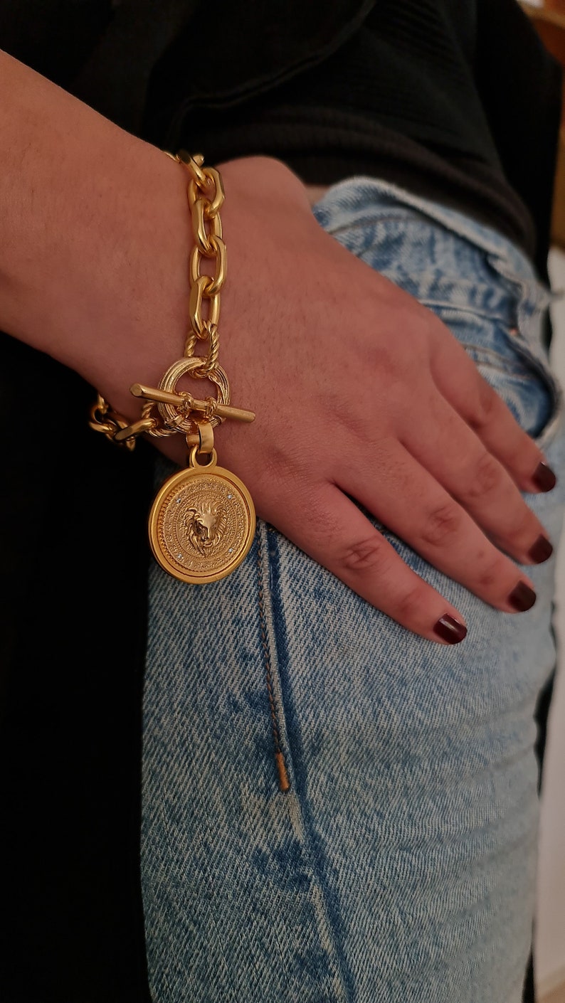 Lion coin bracelet set 
Brass plated gold 
LINK:
https://etsy.me/3IZWjG7