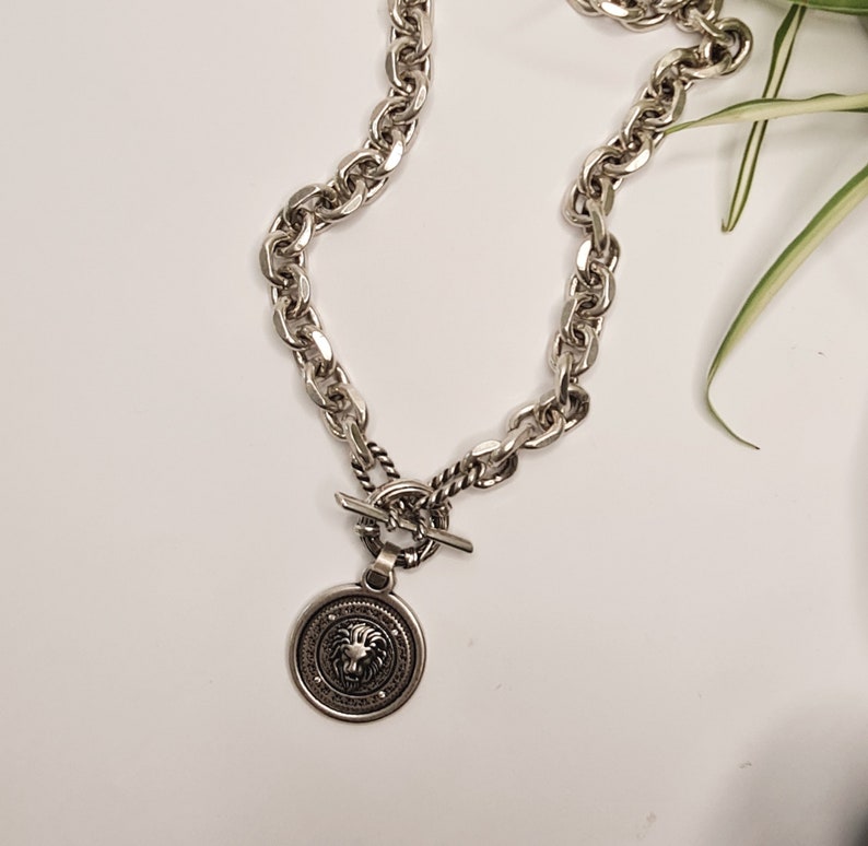 chunky lion coin necklace 
silver plated brass