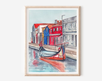 May include: Watercolour painting of a colourful row of houses along a canal with a red boat in the water. The houses are painted in shades of blue, red, yellow, and grey. The boat is a traditional Portuguese fishing boat.