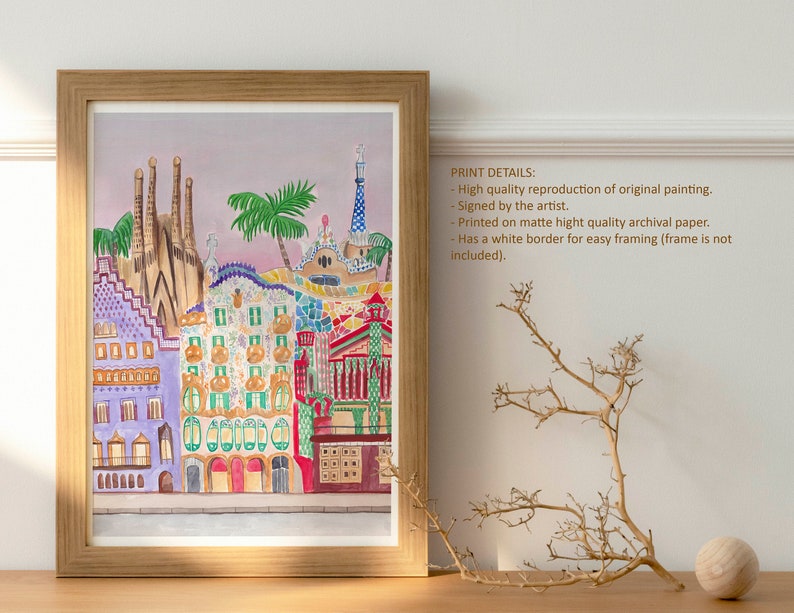 May include: A watercolor painting of colorful buildings in Barcelona, Spain. The buildings are a mix of modern and traditional styles, and they are all decorated with intricate details. The painting is set against a backdrop of a pink sky.